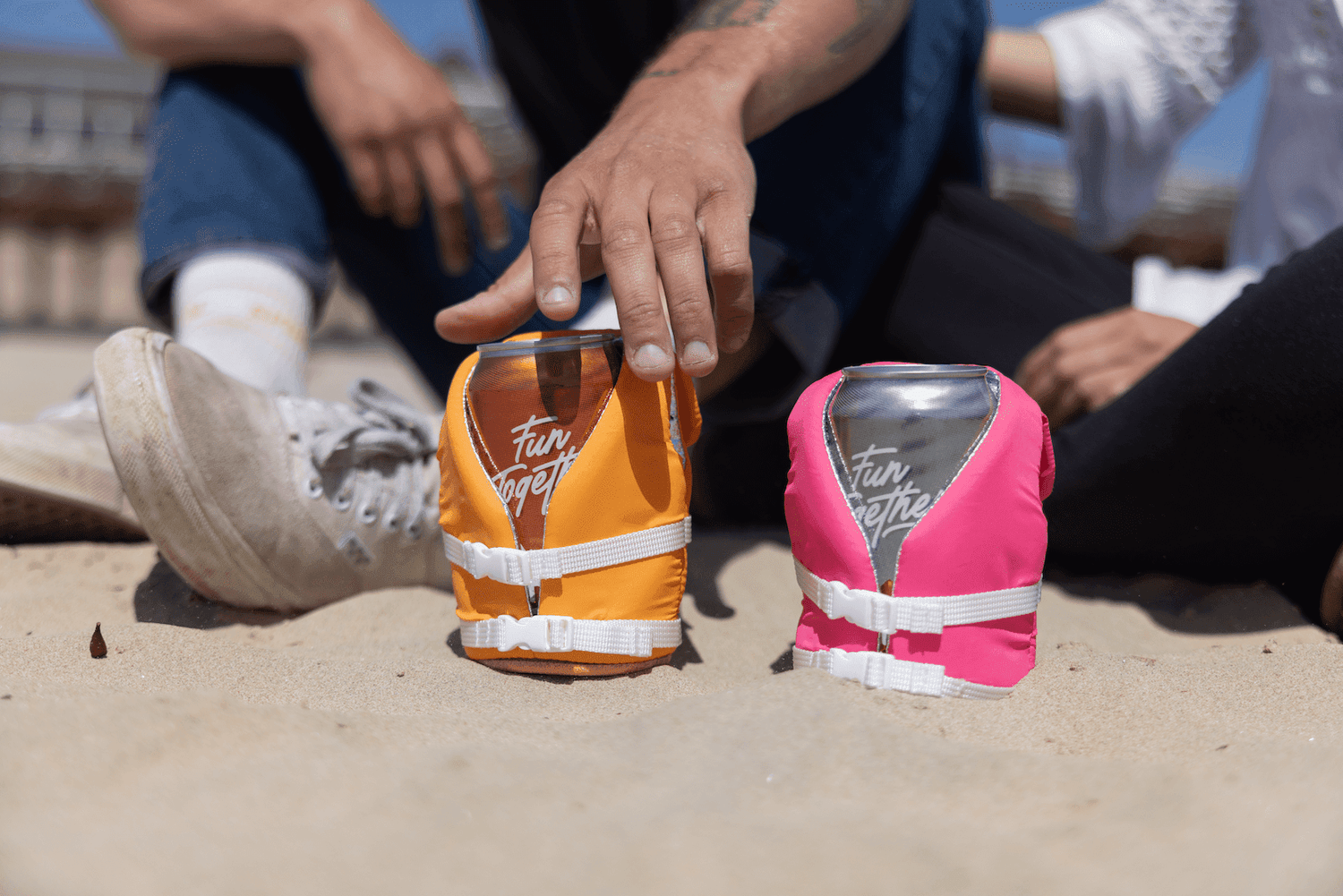 Floating Can Cooler Sleeves on Drinks