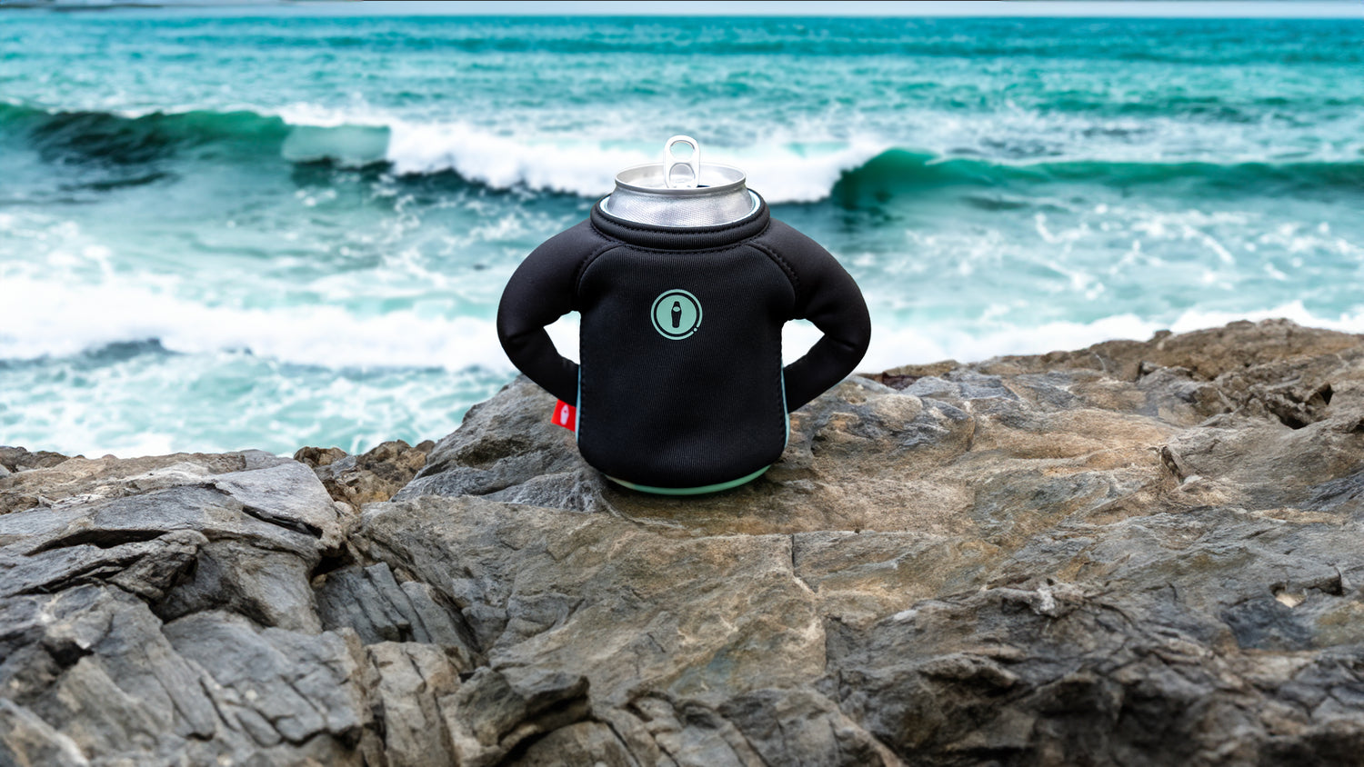 Overlooking the waves with The Dawn - Puffin Drinkwear drink sleeves
